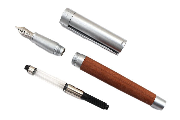 STAEDTLER INITIUM Lignum fountain pen crafted from stained plum wood with matt chrome cap and medium stainless steel nib, presented in Irish Pens luxury gift box.