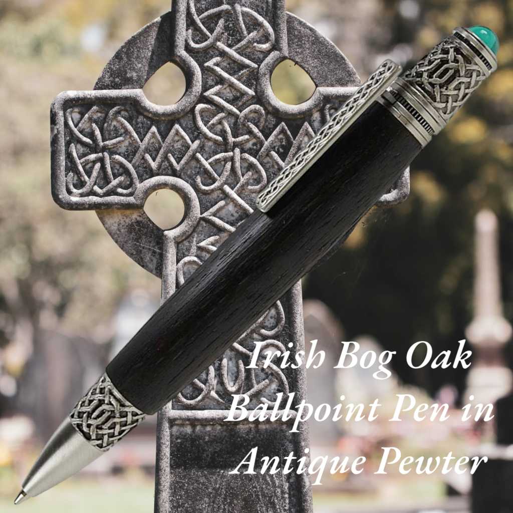 Celtic Knot pen handcrafted from Irish Bog Oak with pewter trim and emerald cabochon