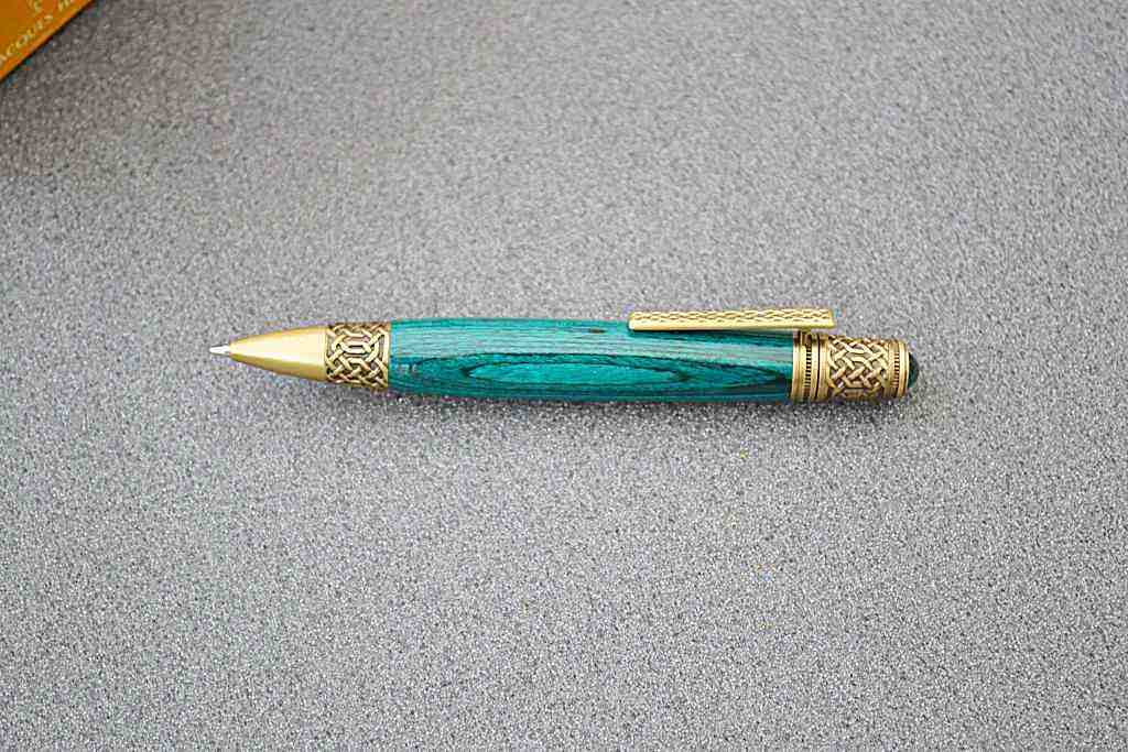 Emerald green Celtic Knot ballpoint pen with antique brass trim and cabochon