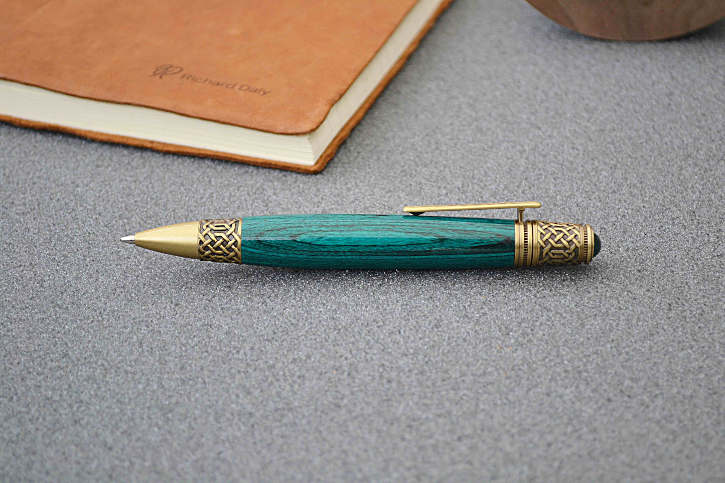 Emerald green Celtic Knot ballpoint pen with antique brass trim and cabochon