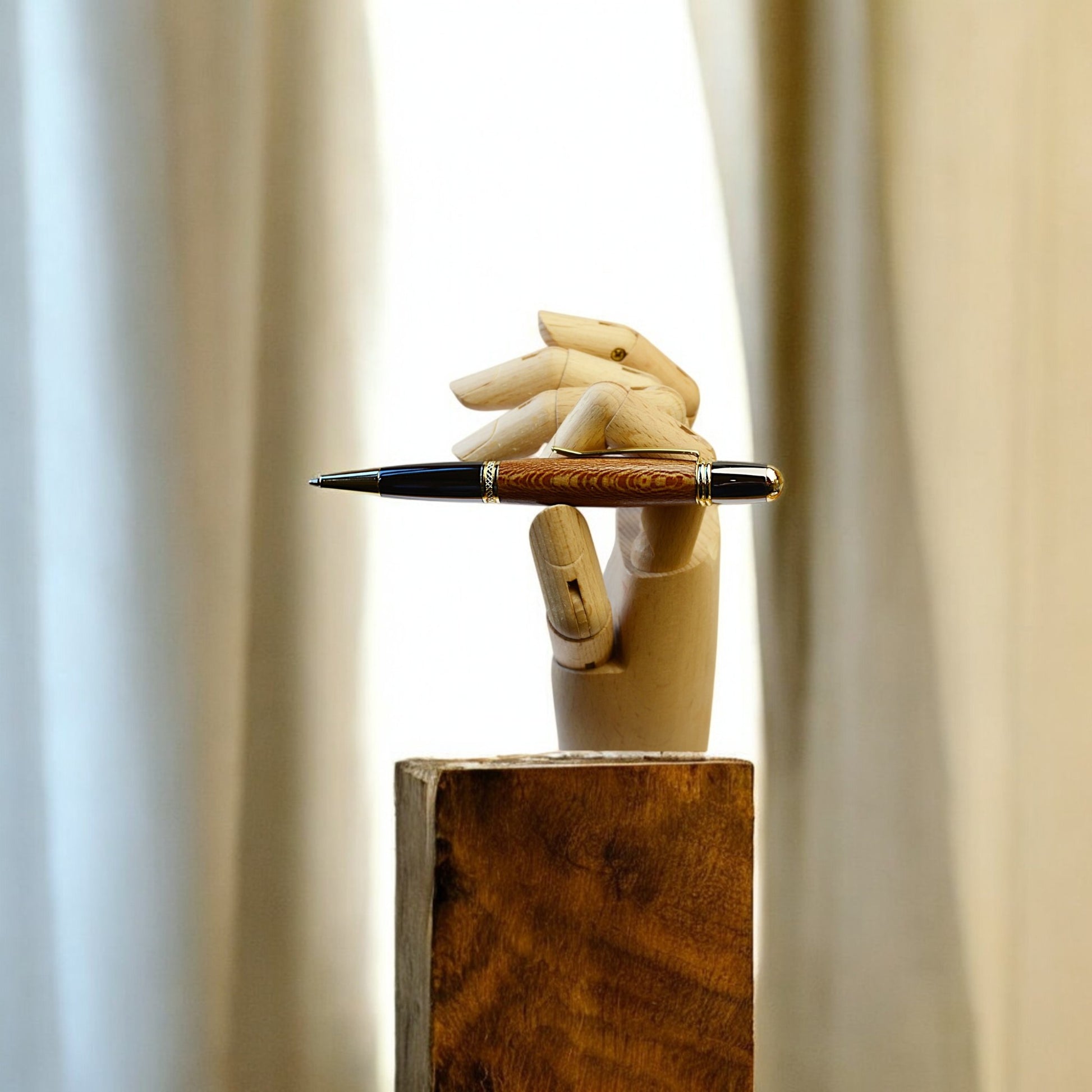 Handmade Irish ballpoint pen crafted from English Plane wood with Gold and Black Titanium trim – inspired by the Book of Kells"