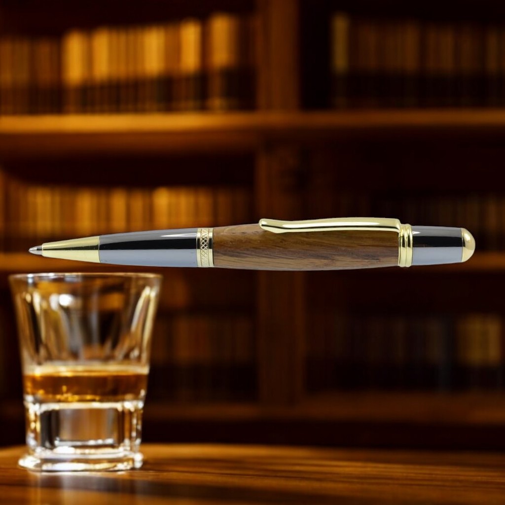 Handmade Irish ballpoint pen crafted from an original Midleton whiskey barrel with gold and black titanium trim – presented in a luxury gift case