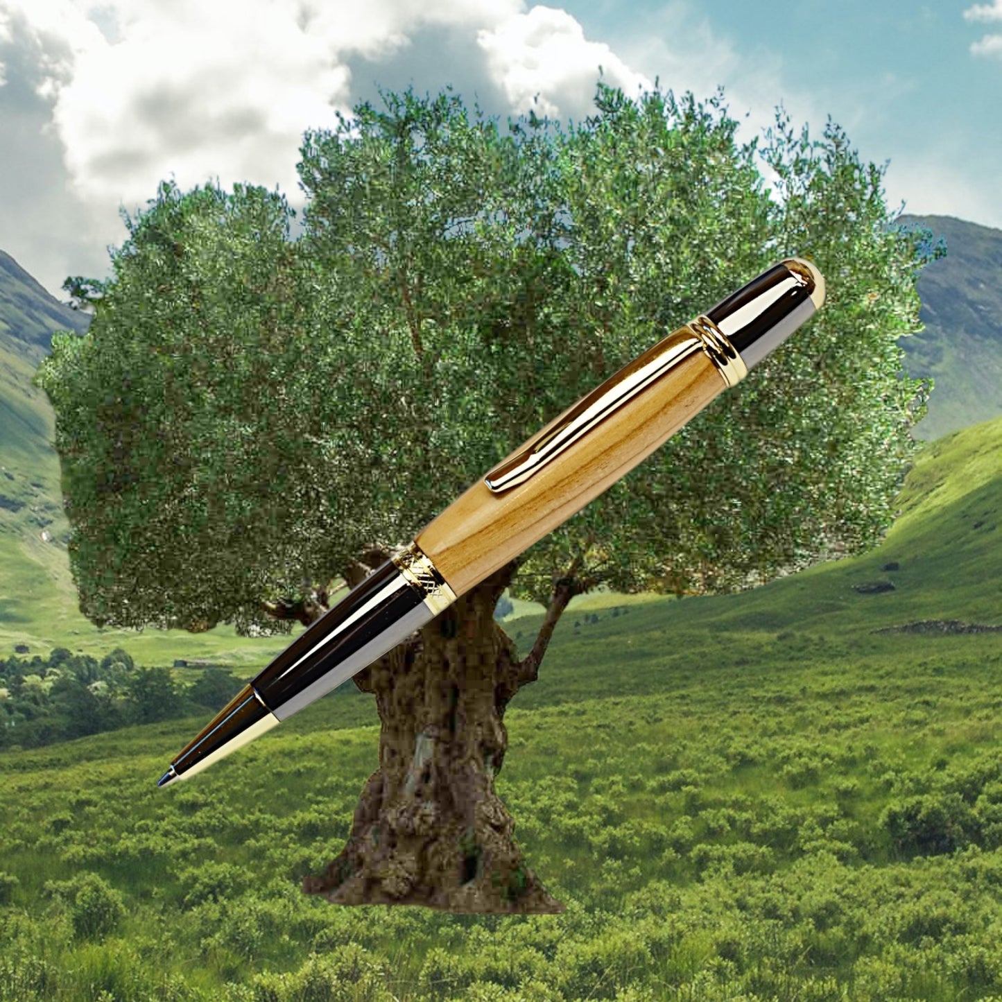 Handmade Olive Wood Ballpoint Pen with gold and black titanium trim, crafted in Ireland by Irish Pens