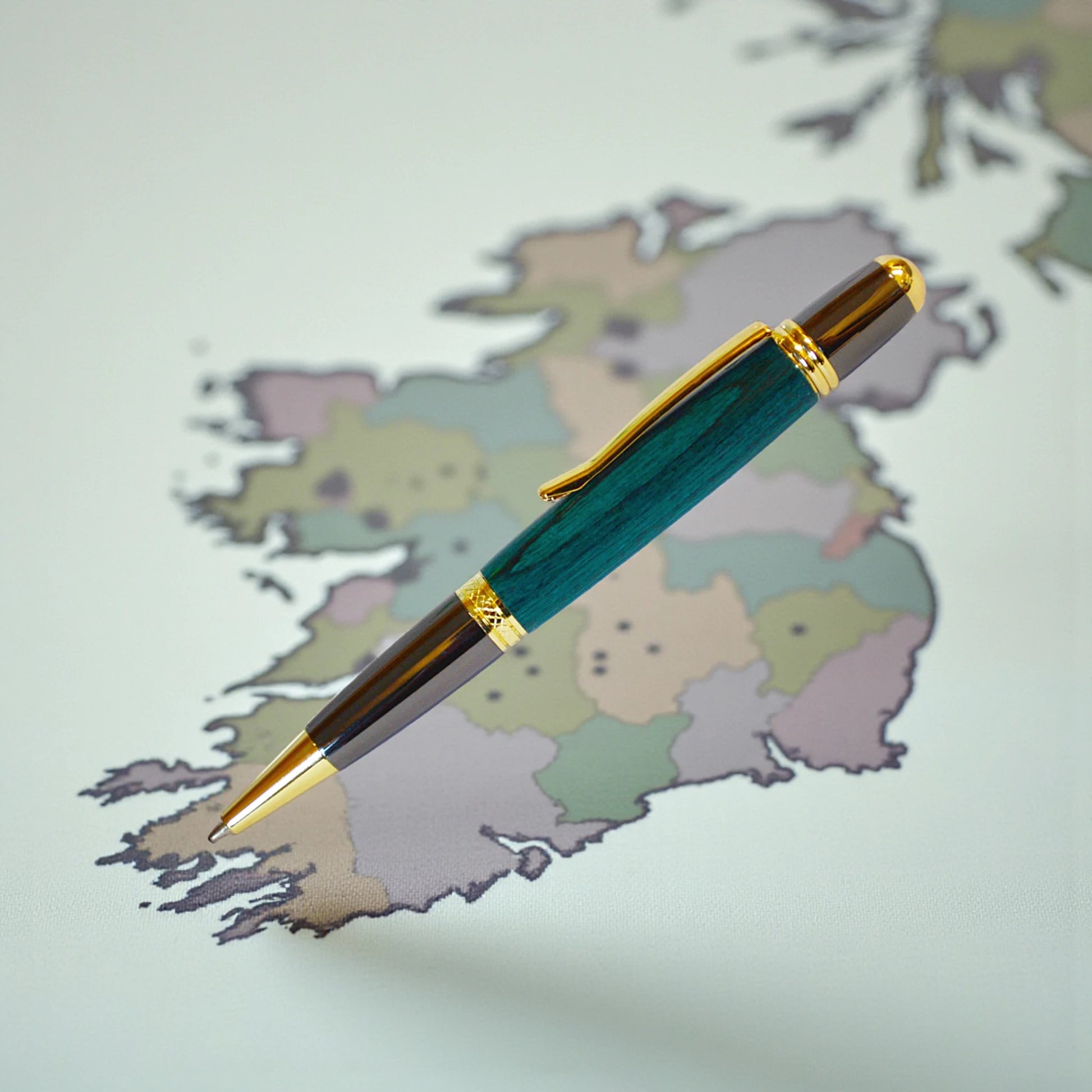 Emerald Green Laminated Wood Sheelin Pen with Black and Gold Titanium Trim – Handmade in Kells, Ireland