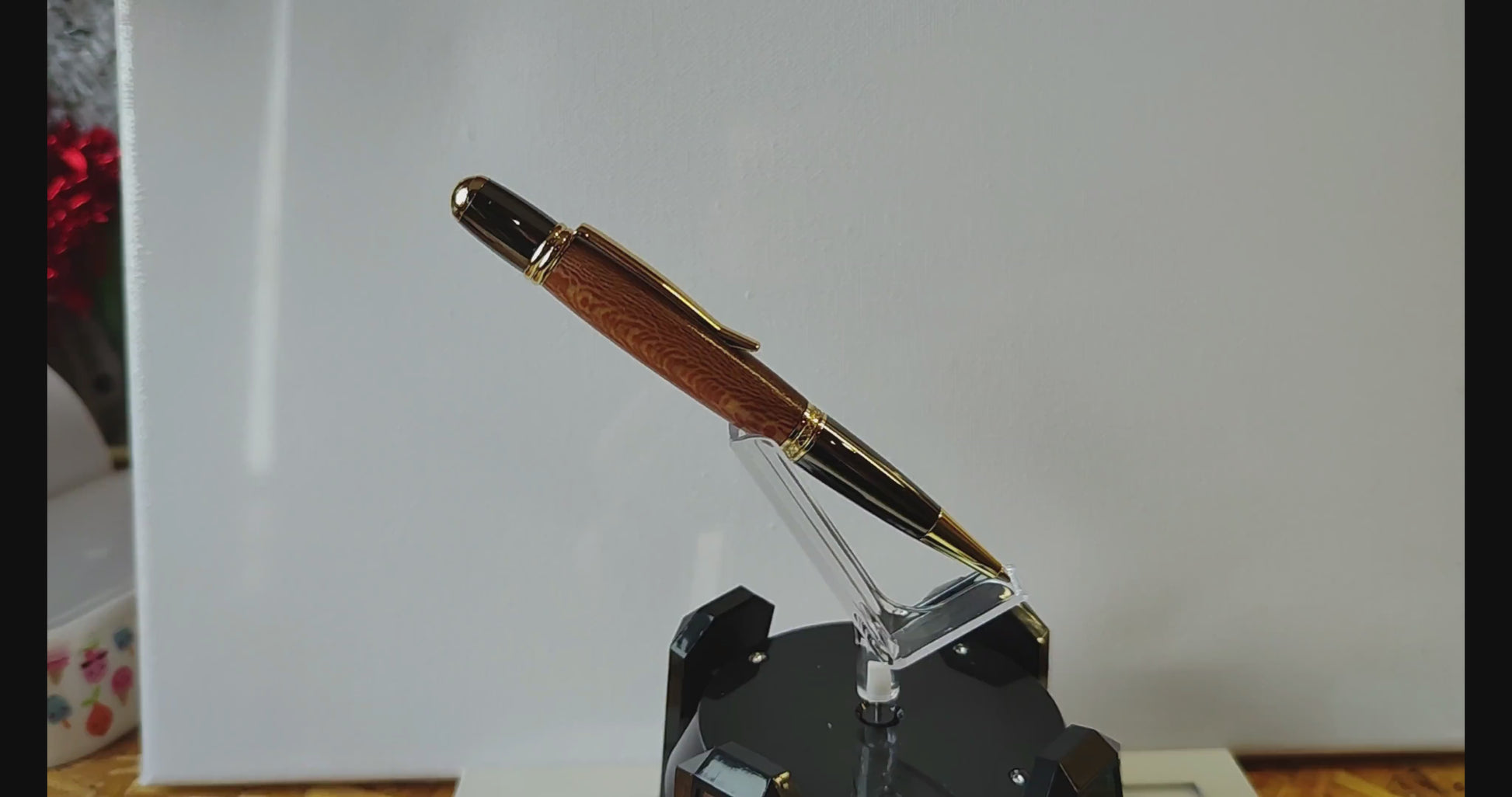 Handmade Irish ballpoint pen crafted from English Plane wood with Gold and Black Titanium trim – inspired by the Book of Kells"