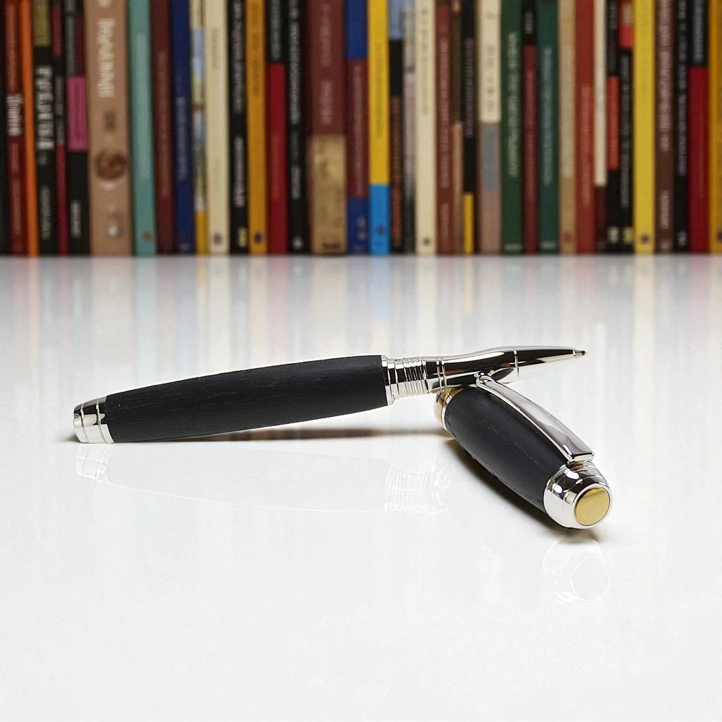 Woodland Rollerball Pen Handmade from Irish Bog Oak with Rhodium and Gold Titanium Trim – by Irish Pens