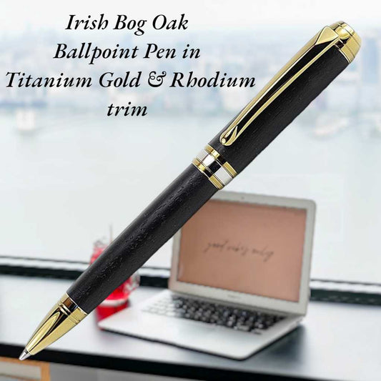 Handcrafted Irish Bog Oak ballpoint pen with gold titanium and rhodium trim