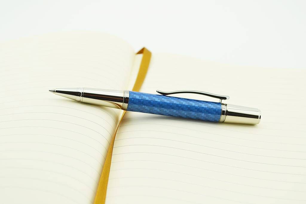 Blue carbon fiber ballpoint in rhodium and titanium accents from the Grove range