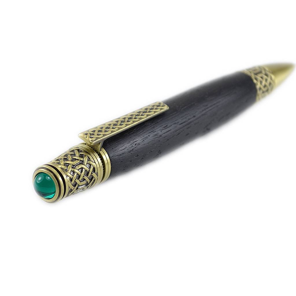 Celtic Knot Irish Bog Oak ballpoint pen with antique brass trim and emerald cabochon
