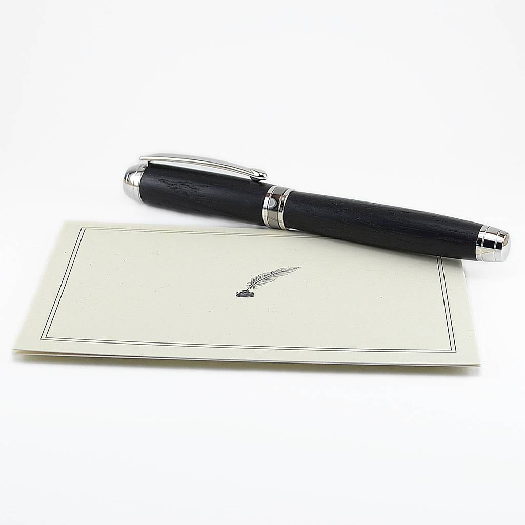 Woodland Rollerball Pen handmade from 5,000-year-old Irish Bog Oak with Rhodium and Black Titanium trim