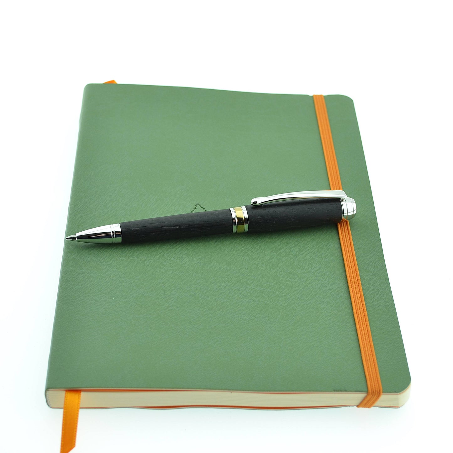 Handmade Woodland Ballpoint Pen crafted from 5,000-year-old Irish Bog Oak with Rhodium and Gold Titanium trim, presented in a luxury case—an elegant, refillable pen celebrating Irish heritage and craftsmanship.