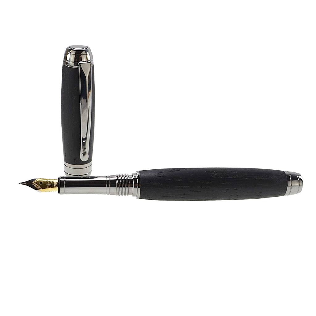 Woodland fountain pen handmade from ancient Irish Bog Oak with black titanium trim, presented in luxury gift case.