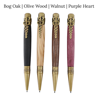Cura Medical Pen hand-turned in Irish Bog Oak, Olive Wood, Irish Walnut and Purpleheart with antique brass caduceus detail