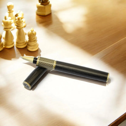 Handmade rollerball pen crafted in Ireland from ancient Irish bog oak, showcasing rich dark grain and traditional craftsmanship.