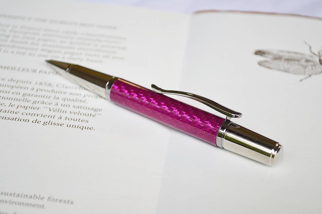 Pink carbon fiber ballpoint in rhodium and titanium accents from the Grove range