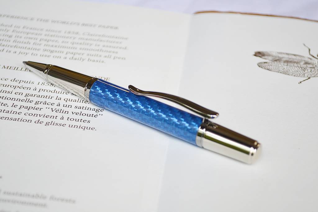 Blue carbon fiber ballpoint in rhodium and titanium accents from the Grove range